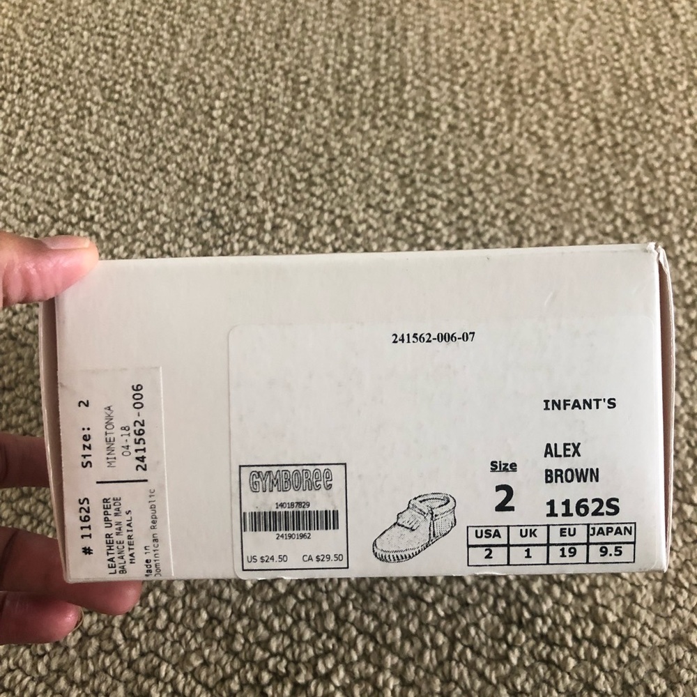 Brand new Minnetonka size 2